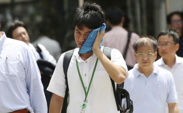 Meteorološka agencija je temperaturo, višjo od 40 stopinj Celzija, namerila še v prefekturah Gifu, Saitama in Tokio. FOTO: AP