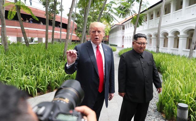 Donald Trump in Kim Džong Un FOTO: Jonathan Ernst/Reuters