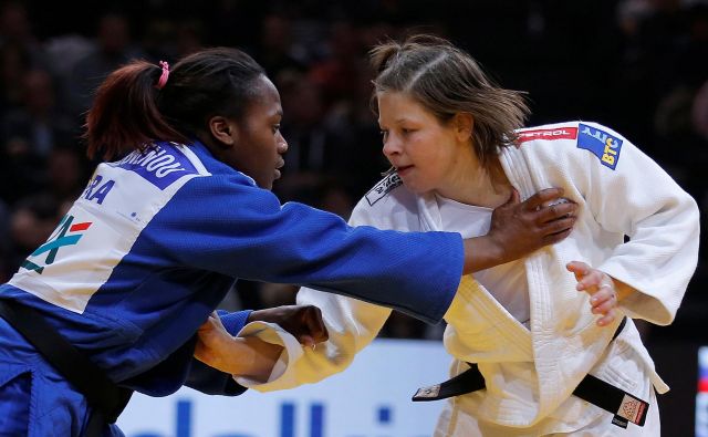 Tina Trstenjak in Clarisse Agbegnenou sta stari znanki s tatamijev. FOTO: Reuters