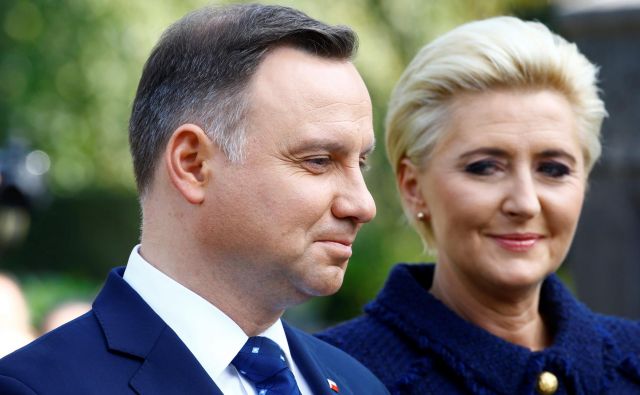 Poljski predsednik Andrzej Duda in žena Agata Kornhauser-Duda. FOTO: Arnd Wiegmann/Reuters