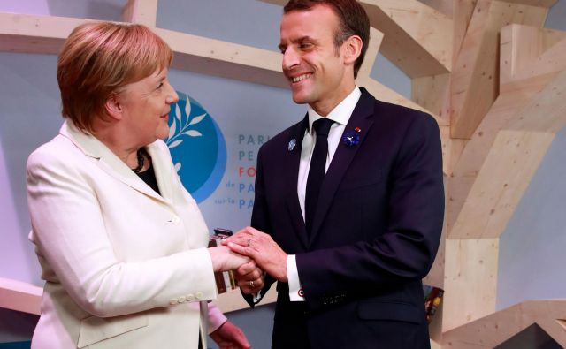 Angela Merkel in Emmanuel Macron sta pozvala k miru. FOTO: Gonzalo Fuentes/Afp