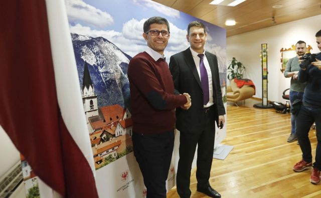 Zoran Stevanović in Matjaž Rakovec po prvem krogu volitev za župana. FOTO: Leon Vidic/Delo