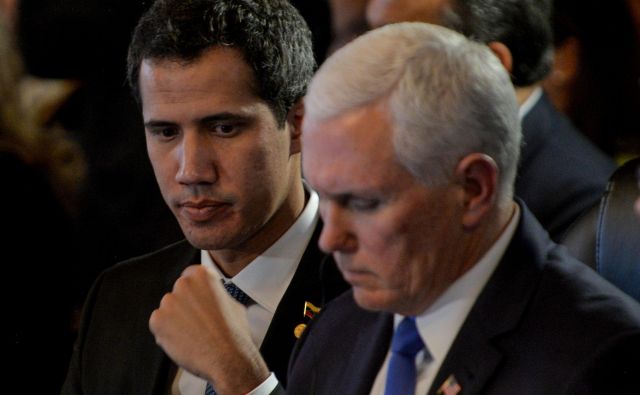 Juan Guaidó in Mike Pence. FOTO: AFP