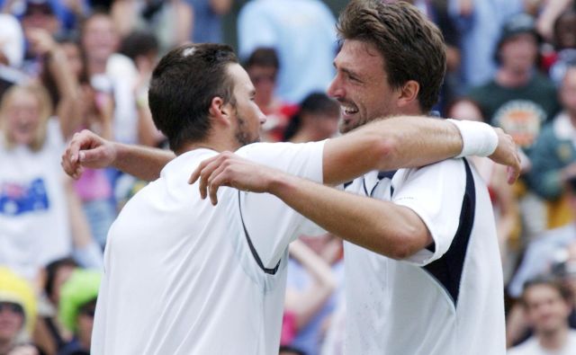 Goran Ivanišević in Patrick Rafter sta pred 18 leti v Wimbledonu odigrala nepozaben dvoboj. FOTO: Reuters