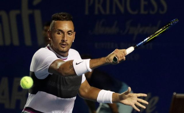 Nick Kyrgios je tokrat spregovoril na igrišču. FOTO: Henry Romero/Reuters