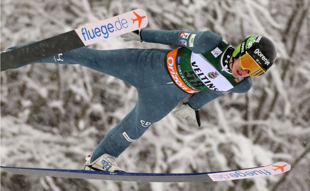 Timi Zajc drži mesto v skupni deseterici turneje. FOTO: Karl-Josef Hildenbrand/AFP