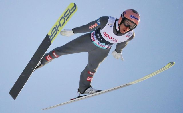 Stefan Kraft se je včeraj razveselil četrte zmage v sezoni in 16. v karieri. FOTO: Reuters