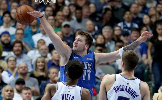 Luka Dončić se je že sedemkrat v sezoni veselil trojnega dvojčka. FOTO: Tom Pennington/AFP