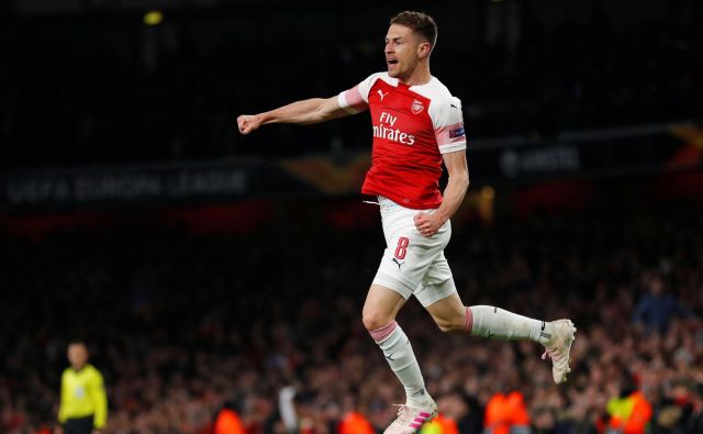 Veselje Arsenalovega vezista Aarona Ramseyja po doseženem golu. FOTO: Reuters