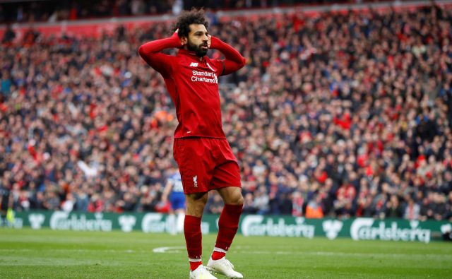 Liverpool je dobil derbi s Chelseajem, gol za končnih 2:0 je zabil Mohamed Salah. Razlika med Liverpoolom in Manchester Cityjem ostaja dve točki. FOTO: Reuters