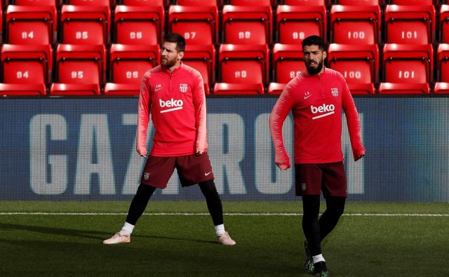 Kdo ju bo ustavil? Lionel Messi (12 golov) hiti proti naslovu prvega strelca lige prvakov v tej sezoni, Luis Suarez se počuti na Anfieldu kot doma. FOTO: Reuters