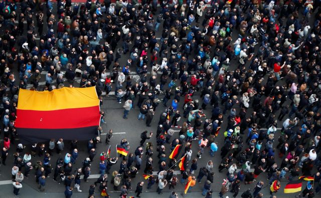 Nemčija je lani ustvarila rekordnih 58 milijard evrov proračunskega presežka. A za kakšno ceno? FOTO: Hannibal Hanschke/Reuters