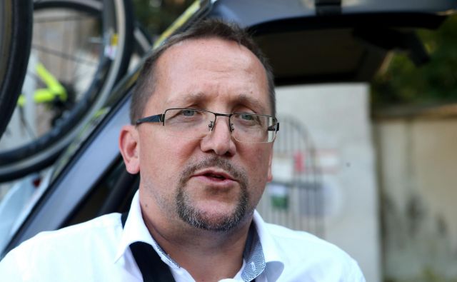 Martinu Hvasitji, ki je bil nekoč tudi sam specialist za vožnjo na čas, se je zdel Rogličev nastop blizu popolnosti. FOTO: Jože Suhadolnik/Delo