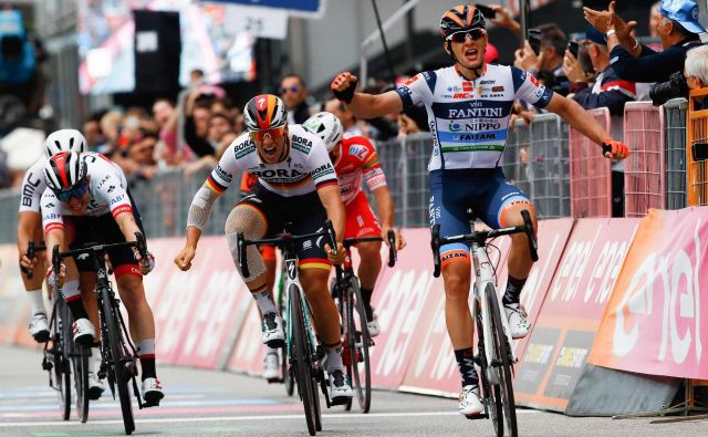 Damiano Cima je zmagal za nekaj decimetrov. FOTO: AFP