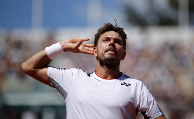 Stan Wawrinka bo v četrtfinalu OP Francije izzval Rogerja Federerja. Njun zadnji pariški dvoboj leta 2015 je dobil v treh nizih in v obupnih hlačah, se spominja Federer. FOTO: Reuters