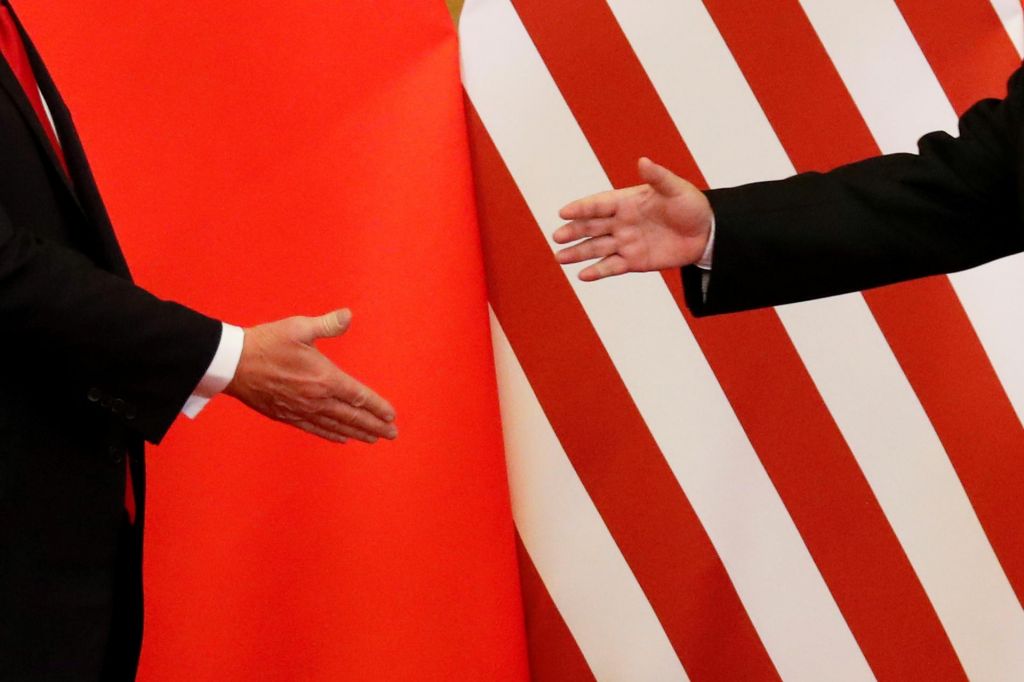 Trump o carinah po srečanju s Xijem, ta krepi odnos s Putinom