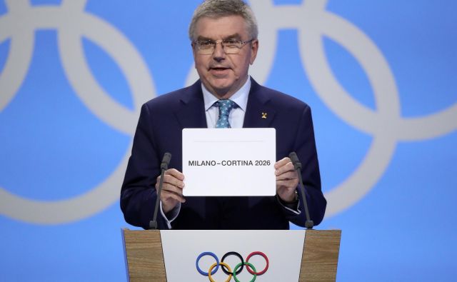 Predsednik medanrodnega olimpijskega komiteja Thomas Bach je v Lozani osrečil italijansko delegacijo. FOTO: Reuters