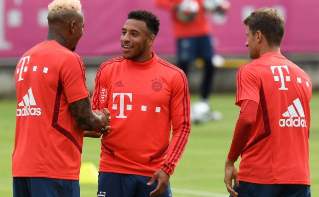 Jerome Boateng, Corentin Tolisso in Thomas Müller so bili za začetek priprav dobre volje. FOTO AFP