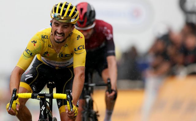 Julian Alaphilippe je bil na Albisu v težavah, a je omilil svoje izgube. FOTO: Reuters