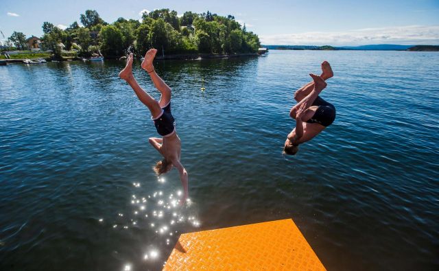 Skoraj zanesljivo bo letošnje poletje med petimi najtoplejšimi v zadnjih 60 letih, najbolj verjetno drugo najtoplejše. FOTO: Trond Reidar Teigen/AFP