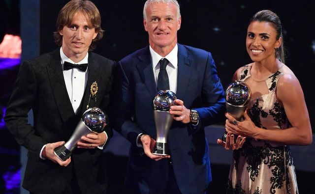 Lanski dobitniki nagrad: Luka Modrić, Didier Deschamps in Marta. FOTO: AFP