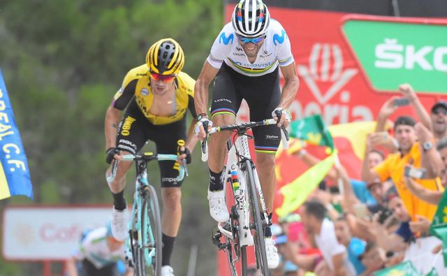 Alejandro Valverde je na vrhu ”zidu” komaj prehitel Rogliča. Foto: AFP