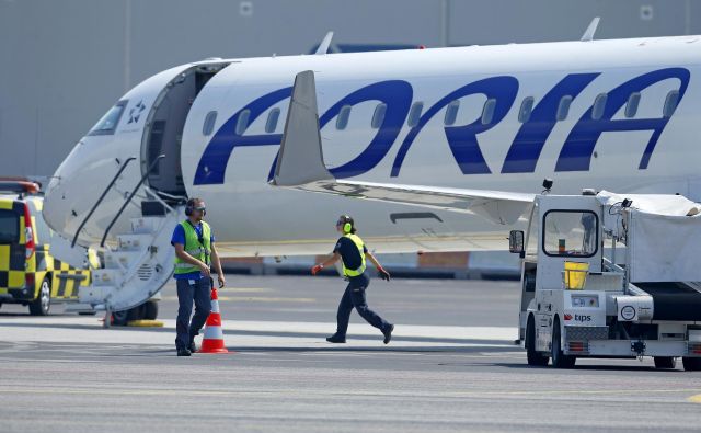 Vodstvo Adrie Airways in Sindikat prometnih pilotov Slovenije sta dosegla sporazum, da napovedane stavke ne bo, so sporočili iz letalskega prevoznika. Foto Matej Družnik