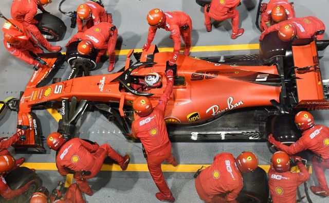 Sebastian Vettel je po sušnih 392 dneh spet slavil zmago. FOTO: AFP