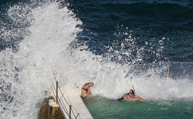 Gladina oceanov se bo povečevala še stoletja. Ob koncu stoletja bo narasla za 30 do 60 centimetrov, tudi če bomo omejili segrevanje na dve stopinji. FOTO: Peter Parks/AFP