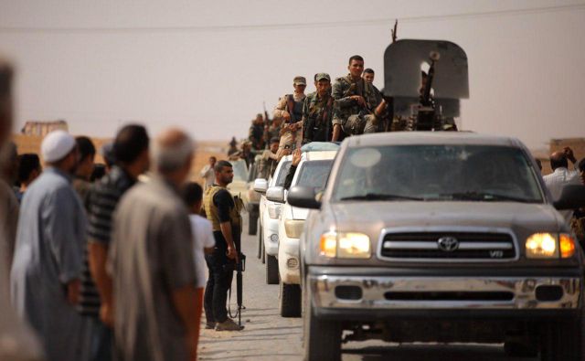 Sirski Kurdi so se bili primorani obrniti na sirske vladne sile. Foto: AFP