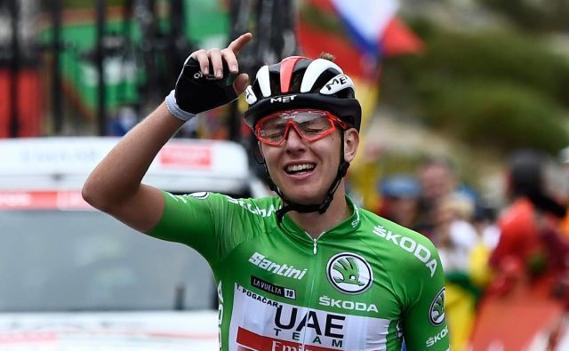 Nepozabni trenutek iz letošnje sezone: zmaga Tadeja Pogačarja v 20. etapi Vuelte, s katero si je zagotovil končno 3. mesto. FOTO: AFP
