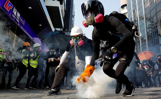 Tisto, kar bolj kot vse povezuje Katalonce in Hongkonžane, je zahteva po ponovni opredelitvi njihove identitete. FOTO:Tyrone Siu/Reuters