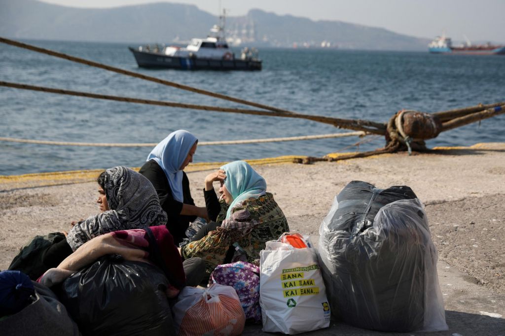 Grški parlament sprejel strožjo azilno zakonodajo