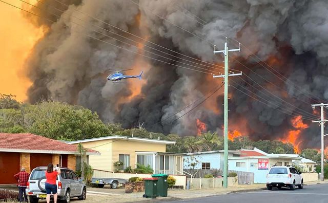 Harrington, 335 kilometrov severnovzhodno od Sydnyja, na udaru plamenov. FOTO: Kelly-ann Oosterbeek/Afp