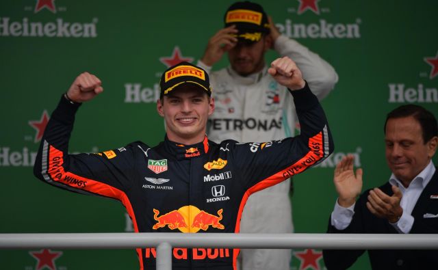 Max Verstappen se je takole veselil zmage v Sao Paulu. FOTO: AFP
