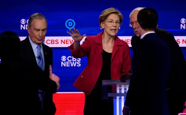 Mike Bloomberg, Elizabeth Warren in Bernie Sanders po televizijskem soočenju. FOTO: Jim Watson/AFP