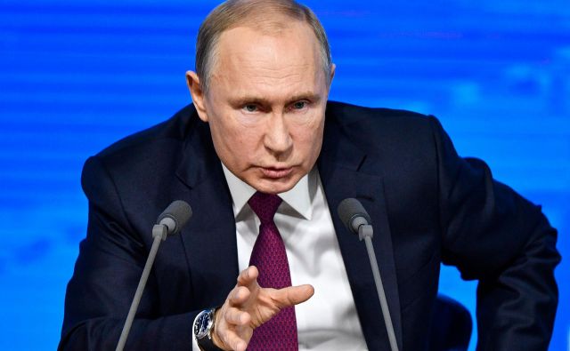 Ruski predsednik Vladimir Putin želi vpis vere Rusov v Boga in heteroseksulnega zakona v ustavo. FOTO: Alexander Nemenov/AFP