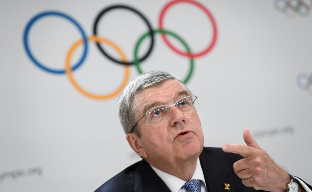 Thomas Bach, prvi mož Mednarodnega olimpijskega komiteja, si ne želi zapletov okrog Tokia 2020. FOTO: AFP