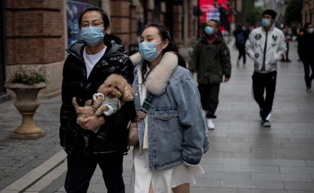 Življenje v kitajskem Wuhanu se vrača v običajne tirnice. FOTO: Noel Celis/AFP