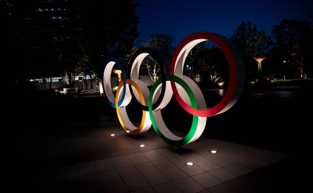 Epidemija koronavirusa je tudi japonske prireditelje olimpijskih iger tako prestrašila, da si ne upajo zagotovoti, da bodo naslednje leto izpeljali največje športno tekmovanje. FOTO: AFP