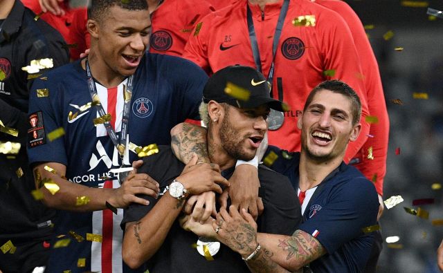 Paris Saint Germain je deset tekem pred koncem postal še devetič francoski prvak, a sezone še ni zaključil, saj se je uvrstil v četrtfinale lige prvakov. FOTO: AFP