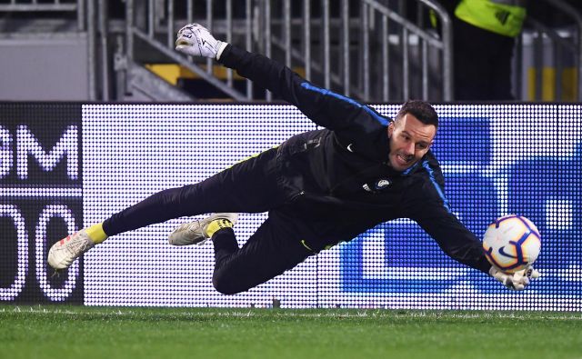 Samir Handanović v vratih Interja je najvišje uvrščeni slovenski nogometaš v italijanski ligi. FOTO: Reuters