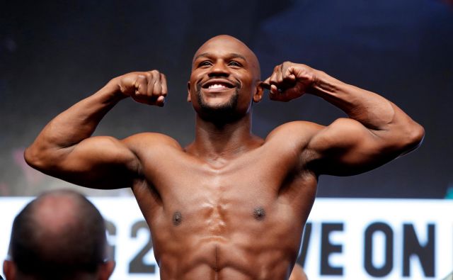 Floyd Mayweather v skoraj 20-letni profesionalni karieri ni izgubili niti enega dvoboja. Zmagal je vseh 50. FOTO: Reuters