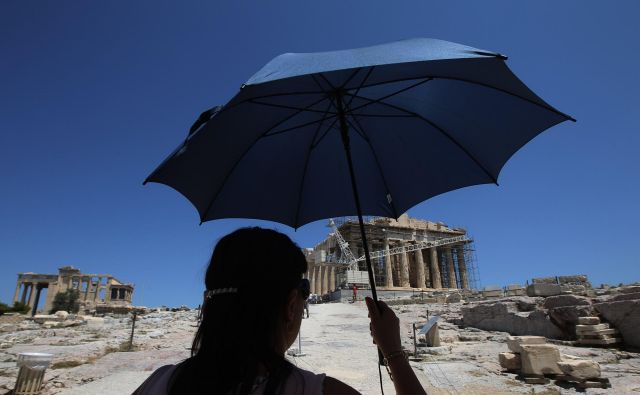 Turisti bodo lahko potovali po Evropi, a gotovo jih bo manj kot v preteklih letih, tudi v Grčiji. FOTO: Reuters