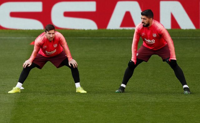 Vodstvo Barcelone je sporočilo, da sta tudi Lionel Messi in Luis Suarez nared za nadaljevanje španskega prvenstva. FOTO: Reuters