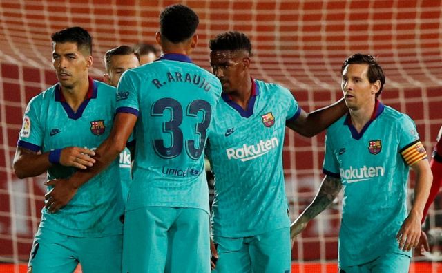 Barcelona je obrambo naslova začela z zanesljivo zmago na Mallorci, zadnji gol za 4:0 pa je dosegel Lionel Messi. FOTO: Reuters