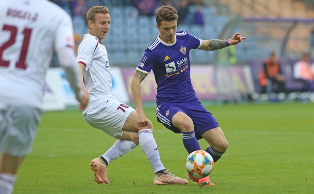 Luka Zahović (desno) in Aleš Mertelj (levo) v eni od akcij. FOTO: Tadej Regent