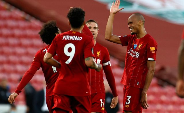 Nogometaši Liverpoola zmagujejo po tekočem traku in so tako po dolgih 30 letih tik pred naslovom prvaka. FOTO: Phil Noble/AFP