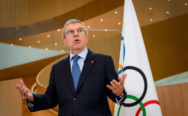 Prvi mož MOK Thomas Bach je nedavno obiskal francoskega predsednika Emmanuela Macrona. Pariz bo leta 2024 gostil olimpijske igre. FOTO: Fabrice Coffrini/AFP