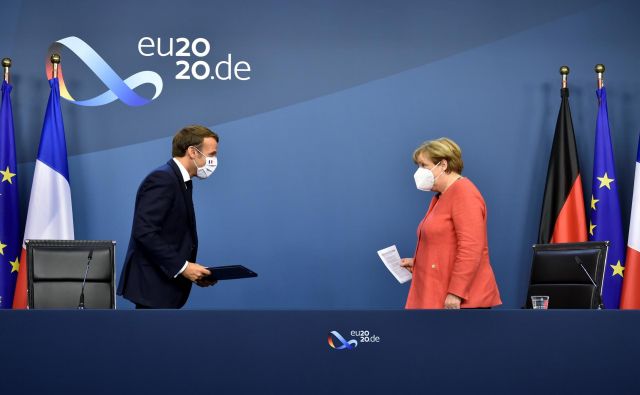 Angela Merkel in Emmanuel Macron FOTO: John Thys/Reuters